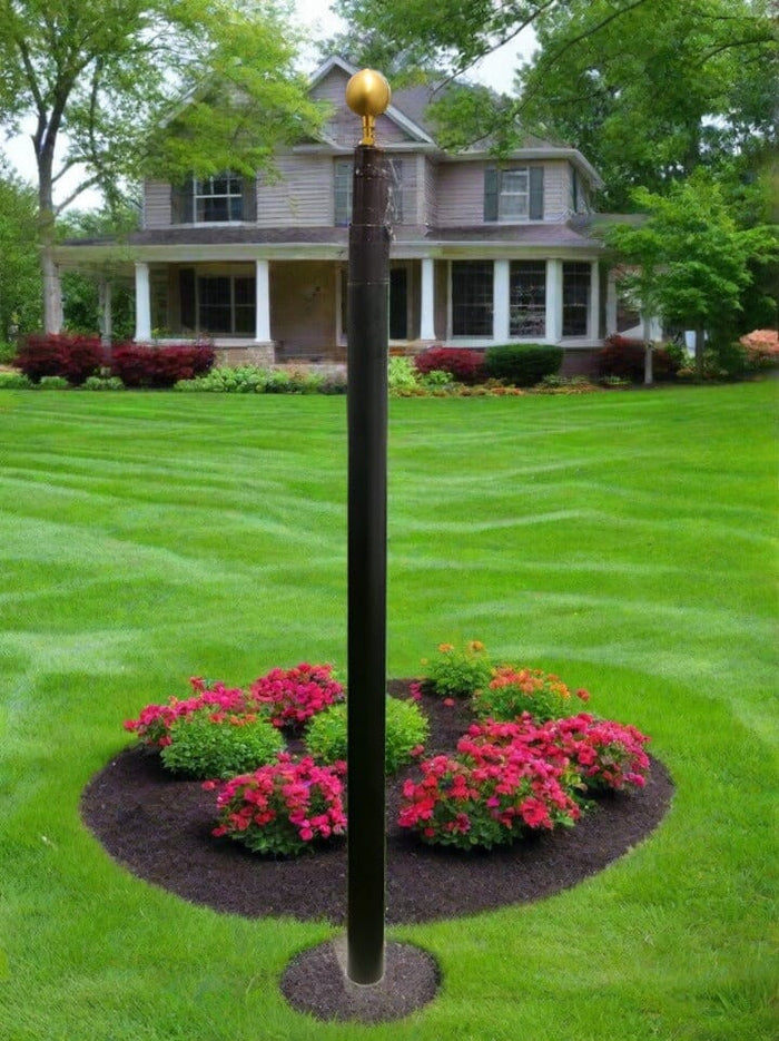 Bronze black heavy duty telescoping flagpole installed in landscaped front yard